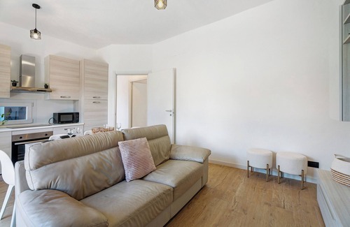 Arona House | Holiday Home 'Villa Lilia Appartamento Verde' with Shared Garden and Wi-Fi