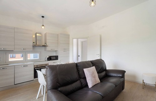 Arona House | Holiday Home 'Villa Lilia Appartamento Blu' with Shared Garden, Balcony and Wi-Fi