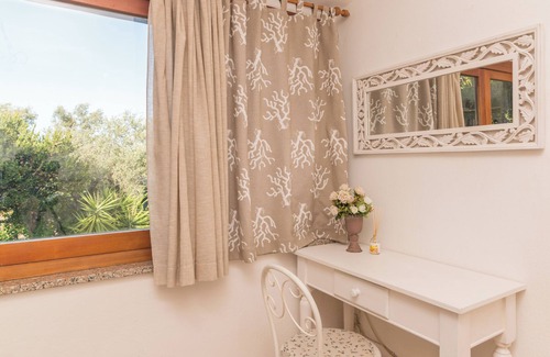 Pittulongu House | Holiday Home "Villa Rosa sul Mare" with Sea View, Terraces & Wi-Fi