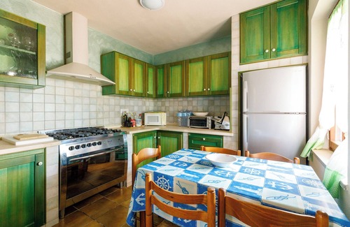 Santa Caterina House | Holiday Home 'Villetta Macchia Mediterranea' with Sea View, Private Terrace and Private Garden