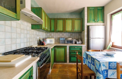 Santa Caterina House | Holiday Home 'Villetta Macchia Mediterranea' with Sea View, Private Terrace and Private Garden