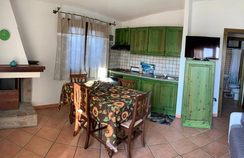 Paduledda House | Holiday Home "Vista Mozzafiato ad Isola Rossa" with Sea View, Private Terrace & A/C