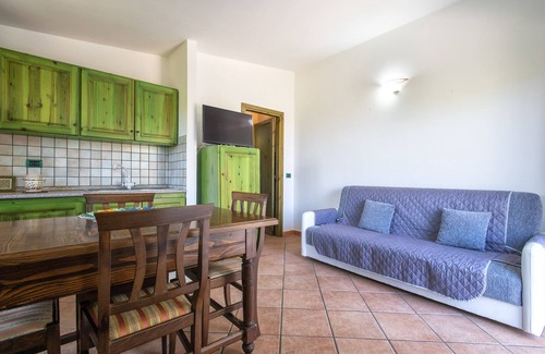 Paduledda House | Holiday Home "Vista Mozzafiato ad Isola Rossa" with Sea View, Private Terrace & A/C