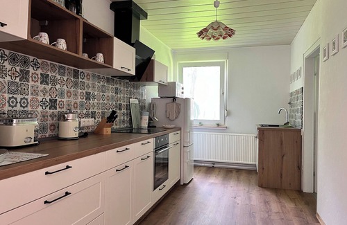 Briesensee House | Holiday Home 'Waldhaus Am See' with Private Terrace, Private Garden and Wi-Fi