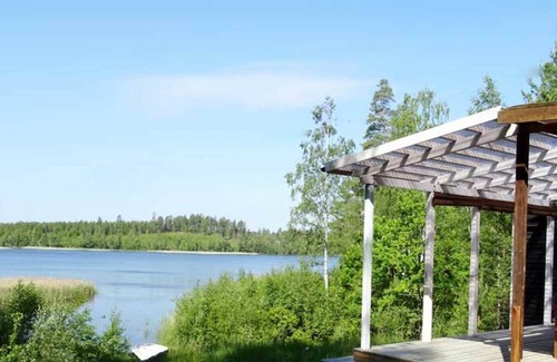 Hultsfred House | Holiday home with direct lake location and bridge