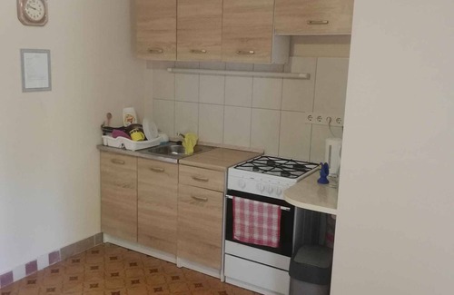Keszthely House | Holiday home with large garden, children's playground and closed parking lot.