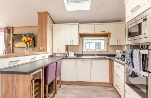 Axminster House | Holiday Home with one double and two twin bedrooms.
