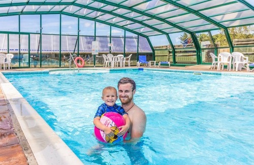 Axminster House | Holiday Home with one double and two twin bedrooms.