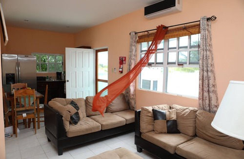 Ladyville Condo | HOME AWAY FROM HOME. AIR-COND. POOL. CLOSE TO AIRPORT.