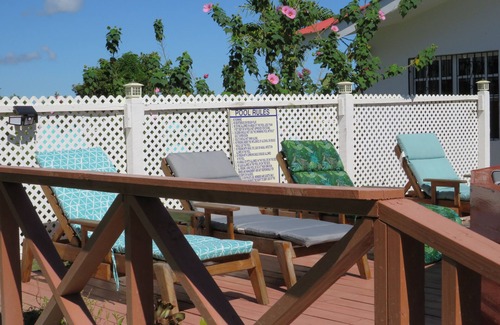 Ladyville Condo | HOME AWAY FROM HOME. AIR-COND. POOL. CLOSE TO AIRPORT.