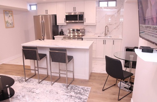Malvern House | Home Away From Home Basement Lodging