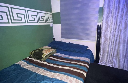 Koforidua Hotel | Home Away from Home singleroom - Roadside RestRoom