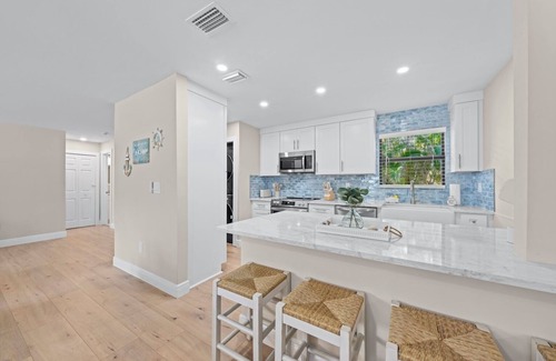 Sanibel Condo | Home away from Home with a pool, pickleball and breathtaking Beach Sunsets