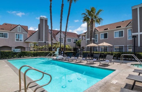 Downtown Village House | Home Away from Home! TWO 2BR Suites w/ Kitchens! Pool, Jacuzzi, Private Parking!