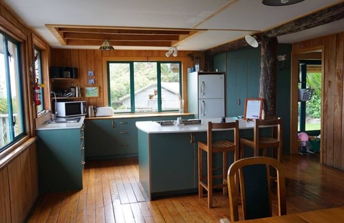 Mokihinui House | Home by the Beach with sensational view! Pet-friendly.