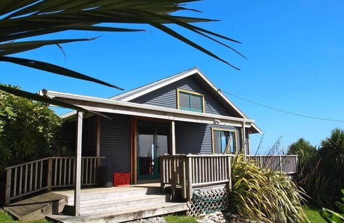 Mokihinui House | Home by the Beach with sensational view! Pet-friendly.