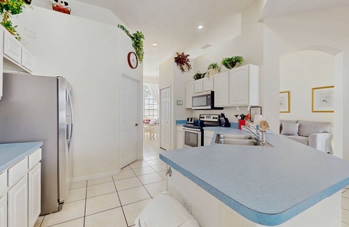 Westridge House | Home near Disney/golf with screened pool, spa, pool table, foosball, AC, & W/D