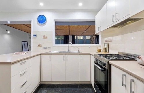 Redwood Park House | Home on Carob is within walking distance to pub, local shopping centre, bus stop