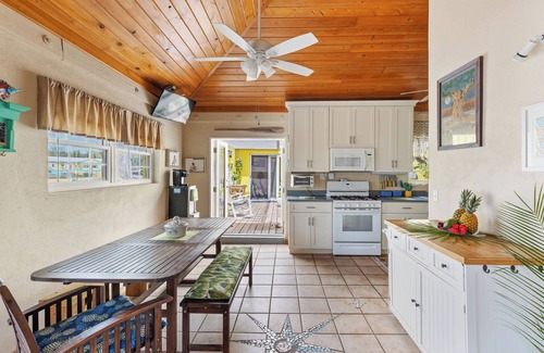 Gregory Town Villa | Home overlooking Gregory Town's famous Cove. Beach chairs and SUP included