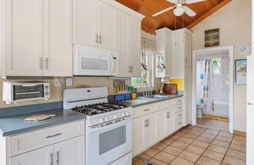 Gregory Town Villa | Home overlooking Gregory Town's famous Cove. Beach chairs and SUP included