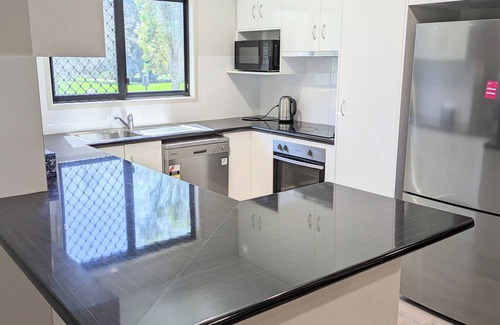 Kearneys Spring House | Home with Golf Course Frontage !