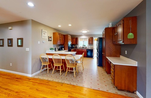 South Burlington House | Home with mountain views, large yard, fire pit, deck & 3-season room