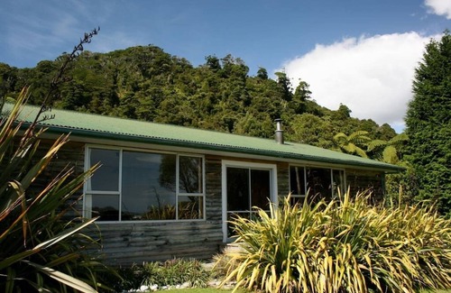 Mokihinui House | Home with stunning River and Ocean views. Pet-friendly