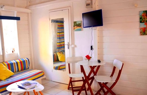 Grand-Bourg House | Homerez - Bungalow 700 m away from the beach with shared pool and jacuzzi