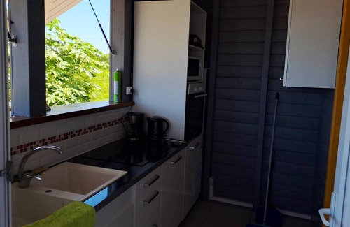 Nord Grande Terre House | Homerez - Bungalow for 4 ppl. with sea view, garden and terrace at Anse-Bertrand