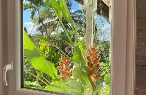 Le Gosier Ski Chalet | Homerez - Charming Chalet in Le Gosier with Private Pool