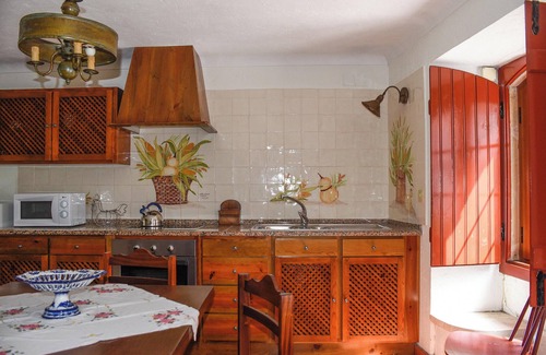 Sao Joao Batista House | Homerez - Charming House in Porto de Mós with Shared Pool