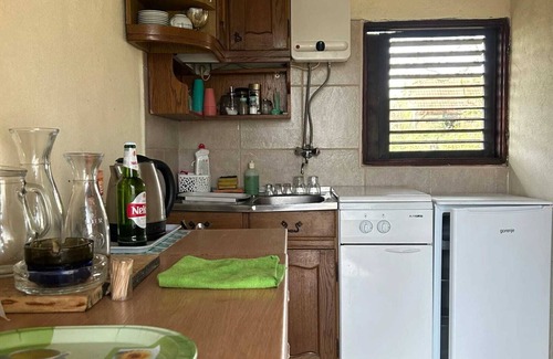 Kutina House | Homerez - Comfortable Bungalow in Kutina with Private Garden