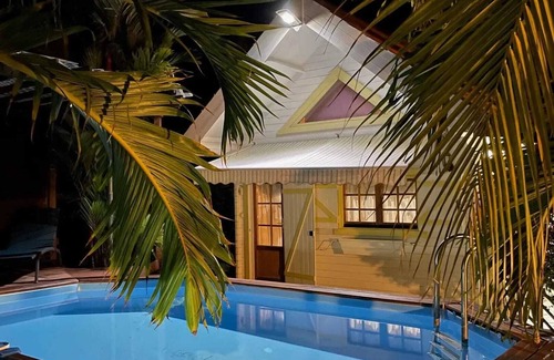 Le Vauclin Ski Chalet | Homerez - Comfortable Chalet in Vauclin with Private Pool