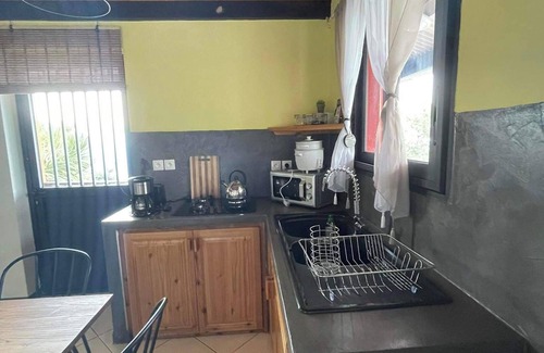 Trois-Bassins House | Homerez - Cosy house with sea view and garden in Trois Bassins