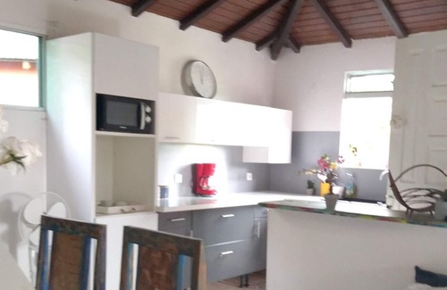 Petit-Canal House | Homerez - House for 4 ppl. with shared pool, garden and terrace at Petit-Canal