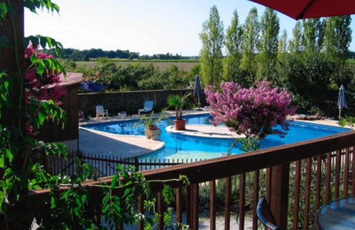 Gemozac House | Homerez - House for 8 ppl. with shared pool, terrace and balcony at Gémozac