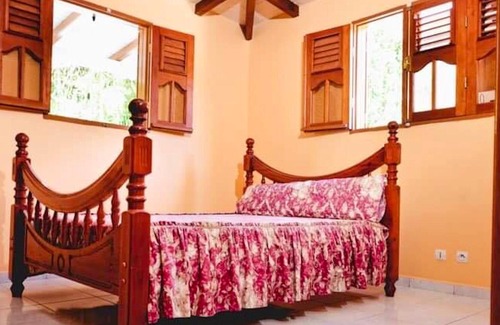 Le Bourg Apartment | Homerez - Nice appartement 15 km away from the beach for 7 ppl. at Morne-à-l'Eau