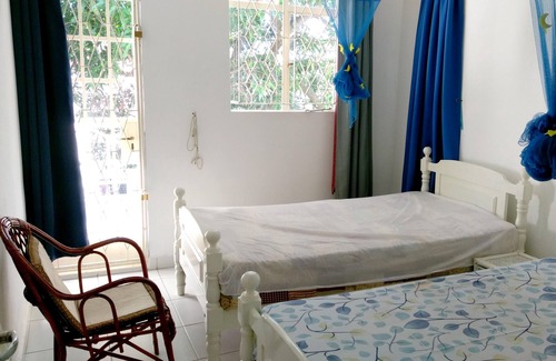 Pointe aux Biches House | Homerez - Nice house for 7 ppl. with shared pool and garden at Trou-aux-Biches