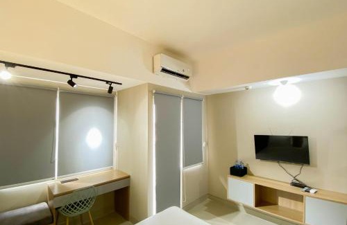 Duren Sawit Apartment | Homey and Well Furnished Studio Gateway Park LRT City Jatibening Apartment By Travelio