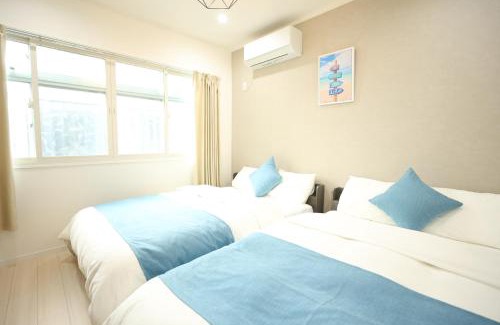 Chinatown Apartment | homey1F I 横浜中華街の中に位置する一戸建ての1階部分 I ダブルサイズ寝具3台最大6人 I 元町中華街駅徒歩3分