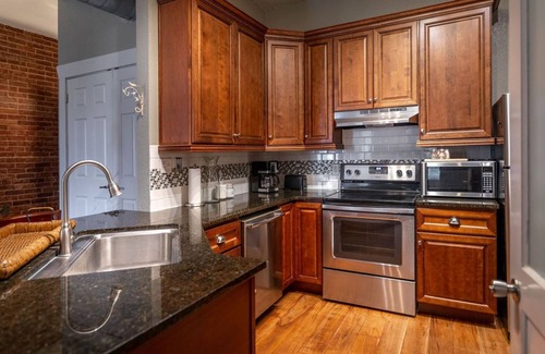 Ozark Apartment | Honeymoon Downtown Boutique Loft - Located in the Historic River District.