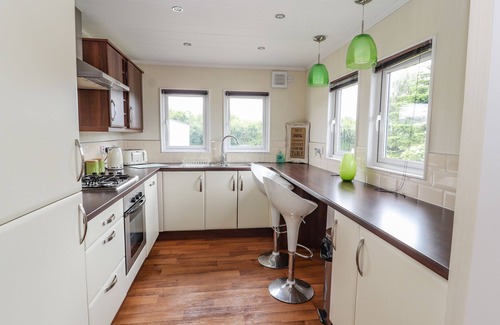 Kinmel Bay Cottage | HONEYSUCKLE LODGE, pet friendly, character holiday cottage in Towyn