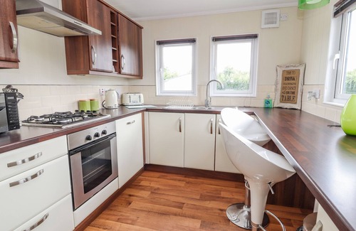 Kinmel Bay Cottage | HONEYSUCKLE LODGE, pet friendly, character holiday cottage in Towyn
