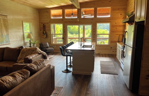 Chatham Cabin | HootnHoller at this secluded 3-bedroom cabin on beautiful Caney Lake.