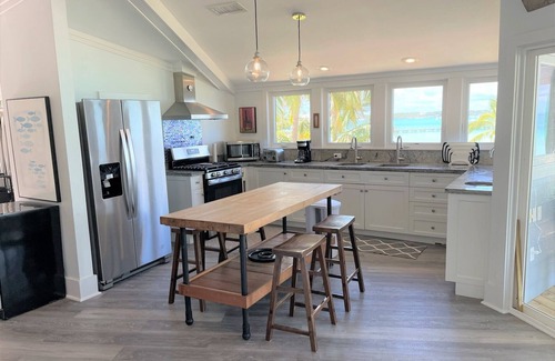 Hope Town House | Hope Town's Top Rental: Beachfront sunsets, AC, free boat dock, & close to town!