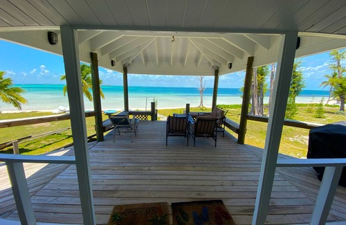 Hope Town House | Hope Town's Top Rental: Beachfront sunsets, AC, free boat dock, & close to town!