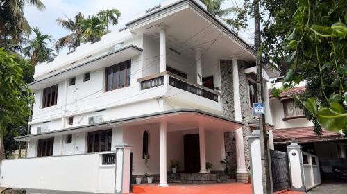 Edapalli Apartment | Hosted by Resmi Jayalal