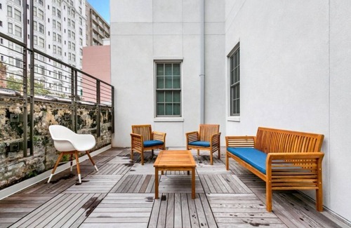 Central Business District Condo | Hosteeva | 2BR Condo in the Heart of NOLA & Blocks to Bourbon St