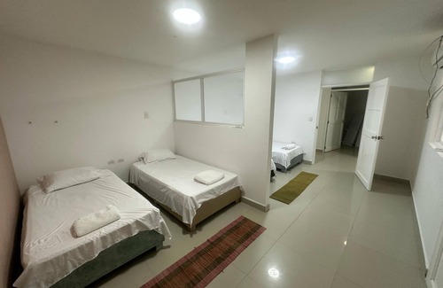 Bocagrande Hotel | Hostel in cartagena 10 minutes from the historical center and 10 meters from the beach.