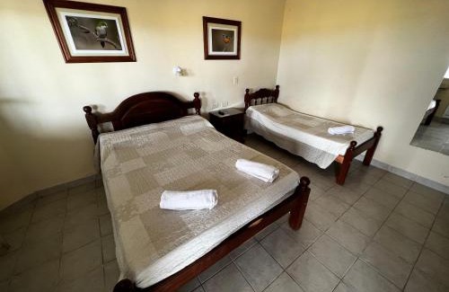 Macachin Hotel | Hostería COPAHUE